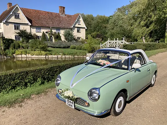 Nissan Figaro classic convertible wedding car exterior