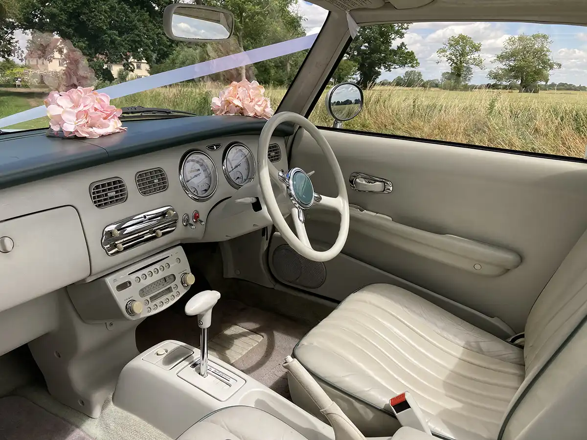 Interior of the Nissan Figaro wedding car for hire
