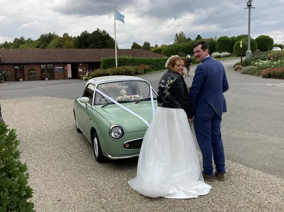Nissan Figaro wedding car at Greetham Valley near Oakham in Rutland